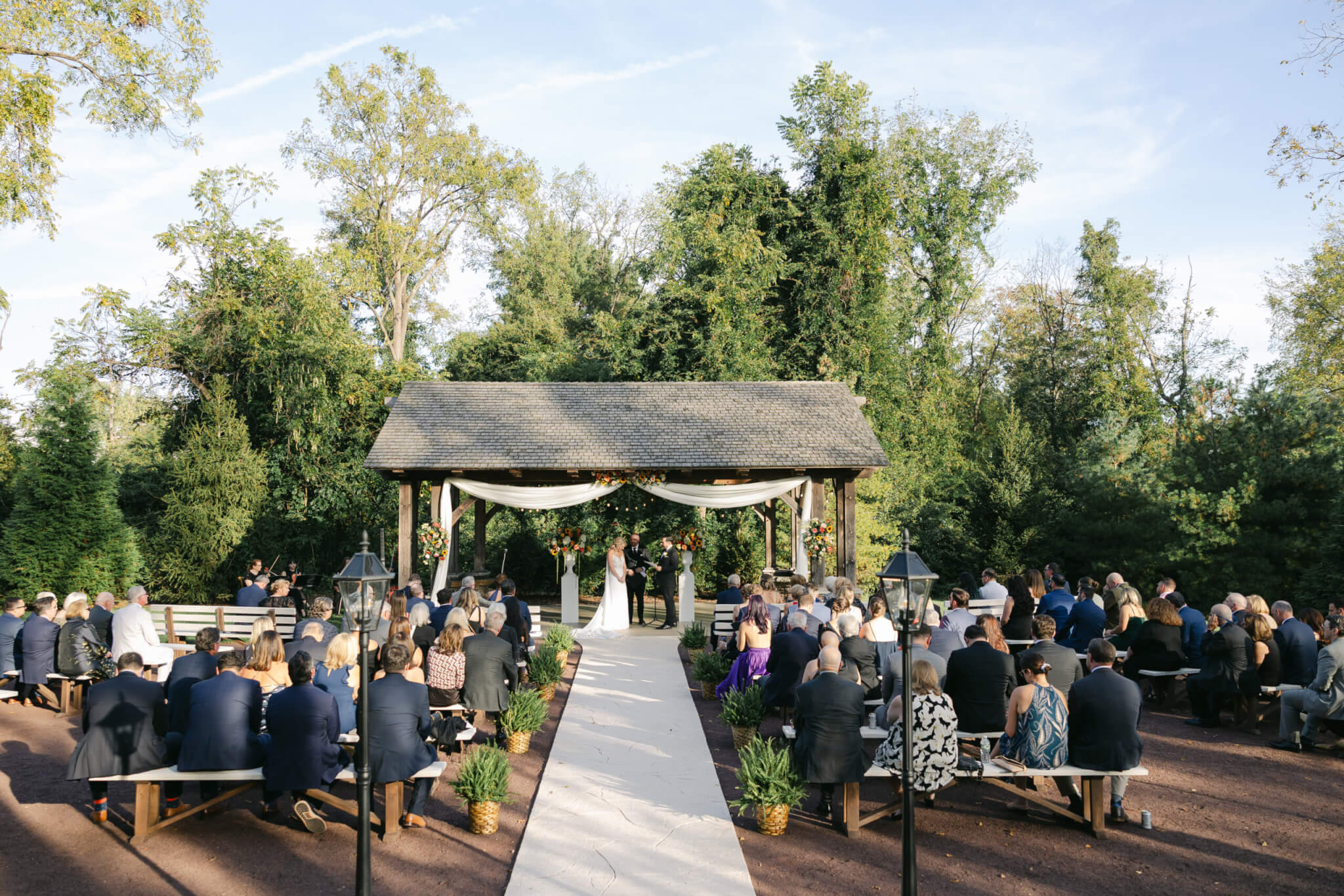 Couple exchanging vows at Lochwood Manor wedding venue