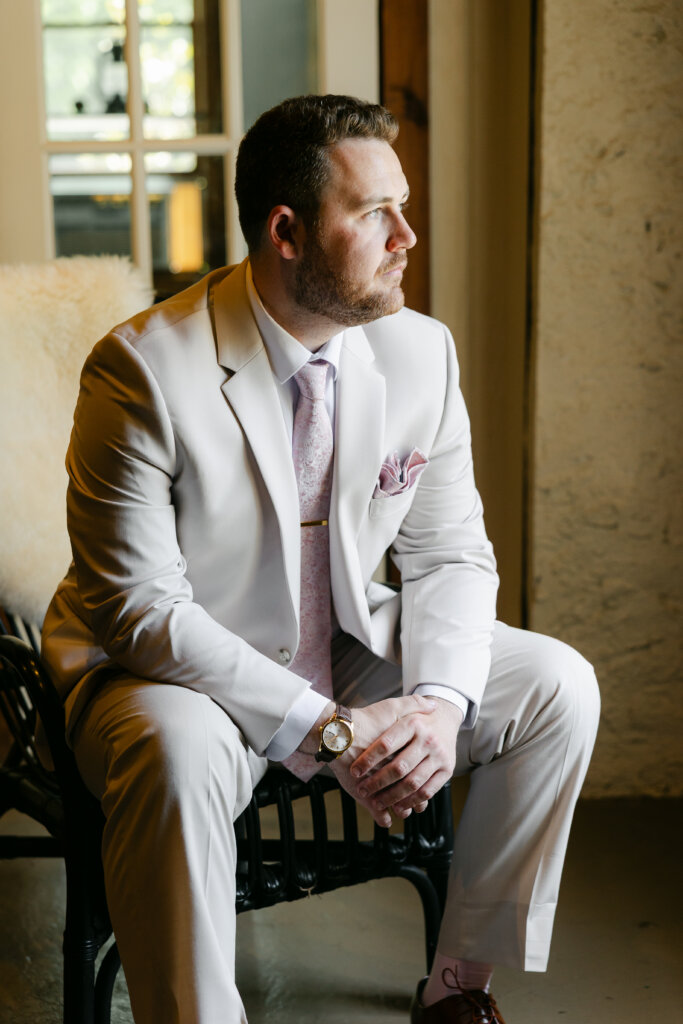 Groom getting ready for wedding at Lochwood Manor