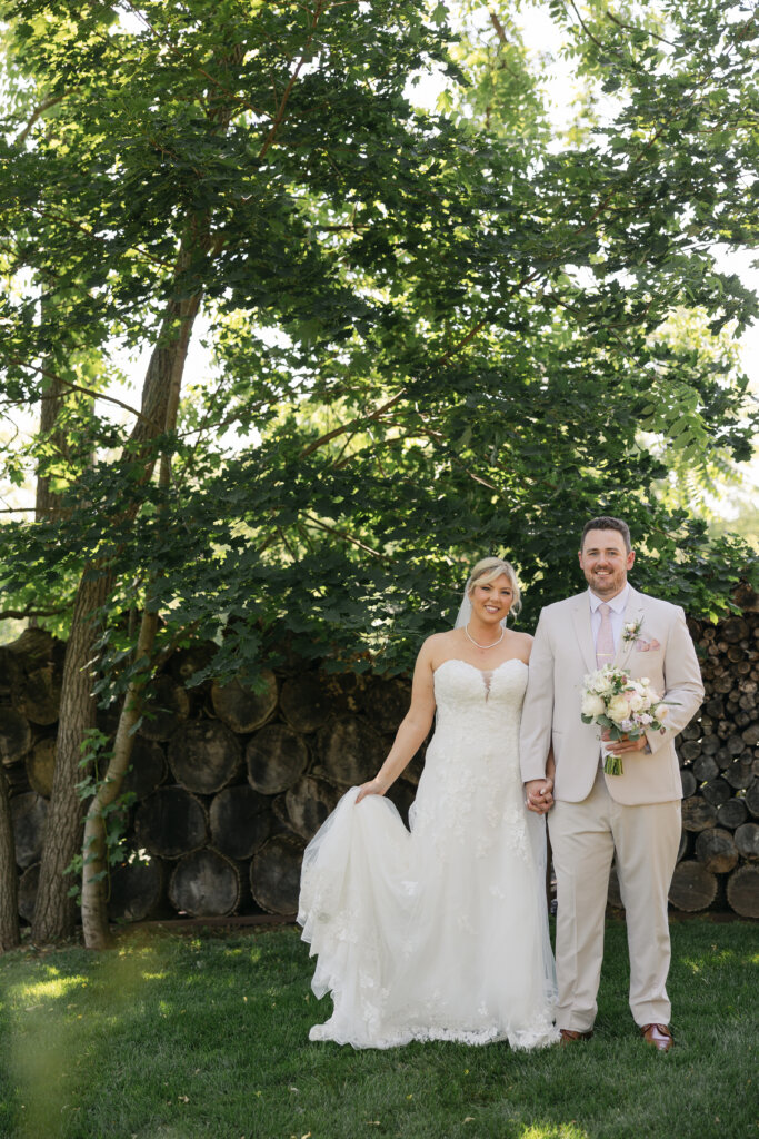 Bride and groom on the grounds at Lochwood Manor, a barn venue in Montgomery County PA