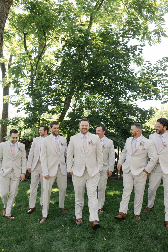 Groomsmen on grounds at Lochwood Manor, a barn venue in Montgomery County PA
