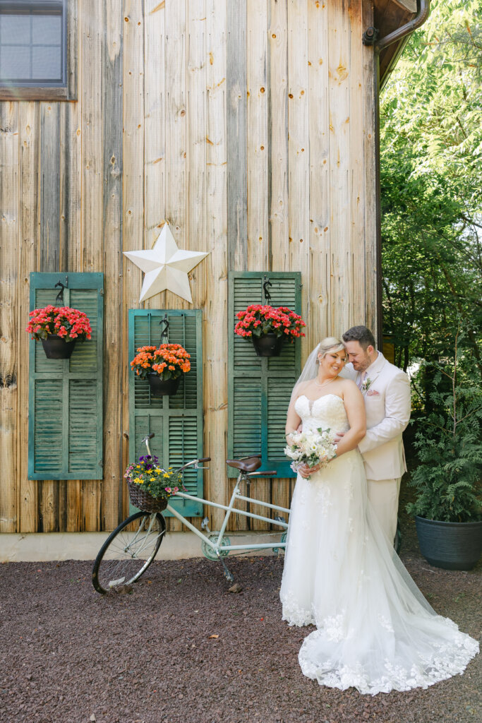 Bride and groom on the grounds at Lochwood Manor, a barn venue in Montgomery County PA