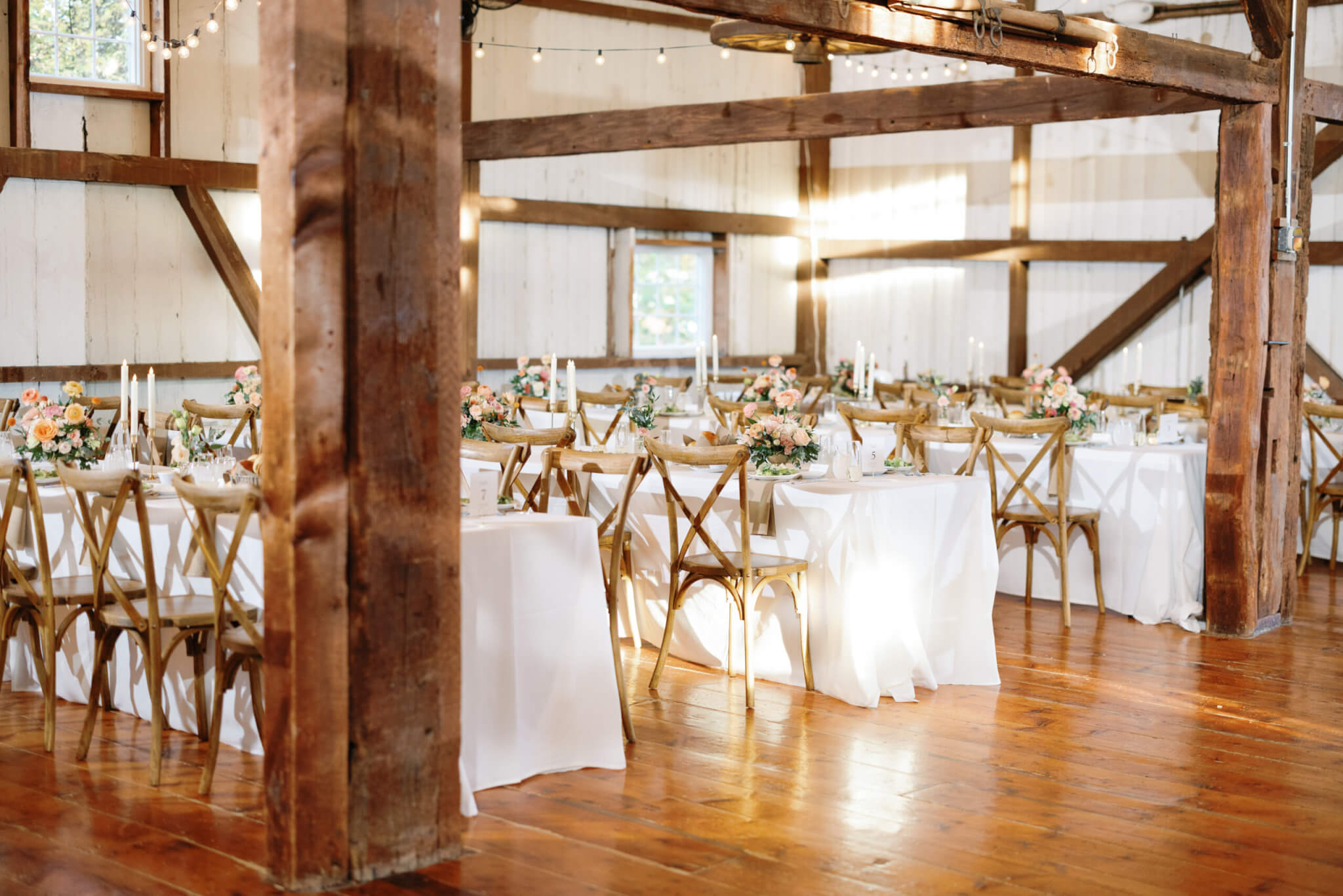 Wedding reception celebration inside the barn at Lochwood Manor